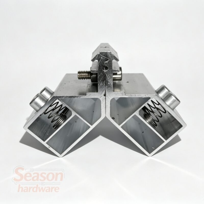 Heavy-duty 90 degree split aluminum profile corner joint with integrated springs for large window and door systems